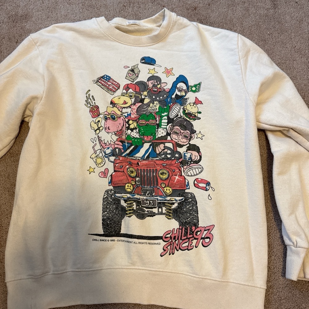 Brandy Melville Cream Crewneck with Colorful Cartoon Jeep Graphic